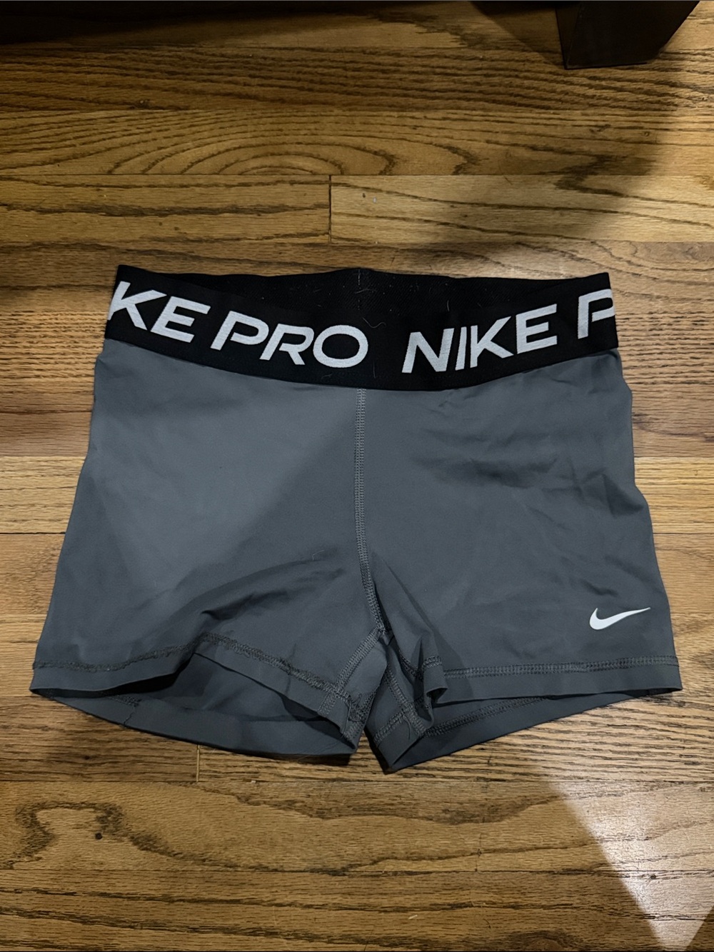 Nike Gray Women's Training Shorts with Black Logo Waistband